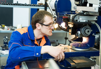 Fototapeta na wymiar worker at machine tool operating
