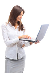 pretty business woman looking at laptop