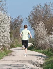 Peel and stick wall murals jogging nature-femme de dos-