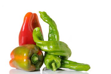 Red and green peppers on white background - 31009439