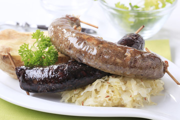 Sausages, sauerkraut and baked potato