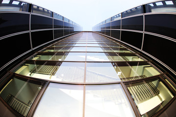 modernes hochhaus,geschäftsgebäude,glasfront,blauer himmel