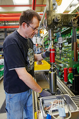 skilled industrial worker, final assembly of electric motors