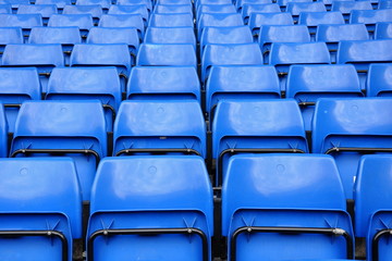 Fototapeta premium Blue seats in row on stadium