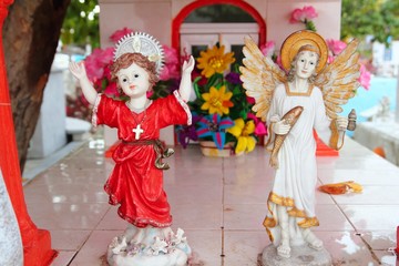 Obraz na płótnie Canvas Caribbean cemetery catholic angel saints figures