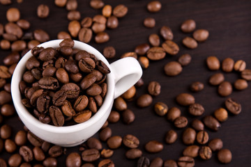 Cup of coffe beans on a table