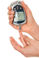 Diabetes patient making glucose level blood test