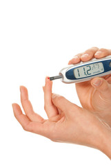 Diabetes patient making glucose blood level test