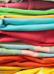 stack of multicolor cotton cloths