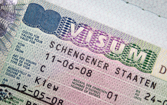 Close-up page of passport with Schengen visa