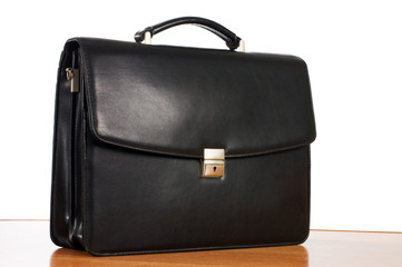 Fashionable leather briefcase on a white background