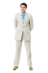Full body portrait of happy smiling businessman, isolated