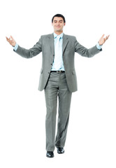 Very happy successful gesturing businessman, isolated