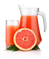Full glass and jug of grapefruit juice and fruits isolated