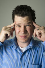 Portrait of Male with Headache
