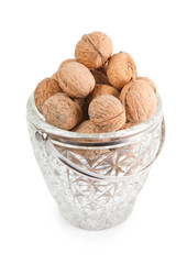 walnuts in the crystal vase isolated on white