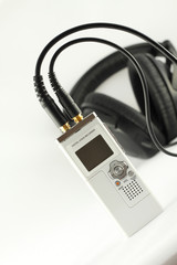 Digital voice recorder and headphone.
