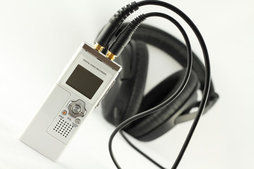 Digital voice recorder and headphone.