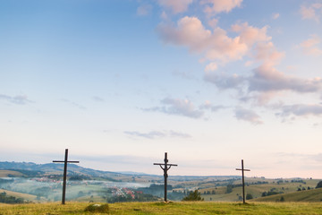 three crosses on hill