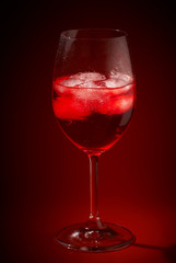red cocktail in a glass