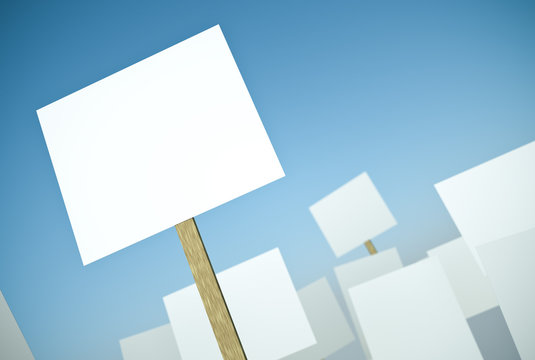 Blank protest banners against blue sky