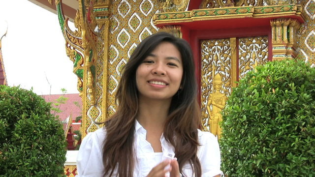 Girl Doing A Thai Style Greeting