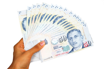 Singapore currency isolated on white background.
