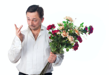 A man with a bouquet of roses