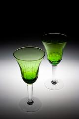 Two glasses of wine on black and white background