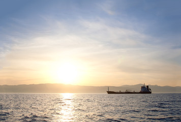 Bulk-carrier ship at sunset - 31051870