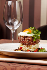 beef burger with egg and potatoes