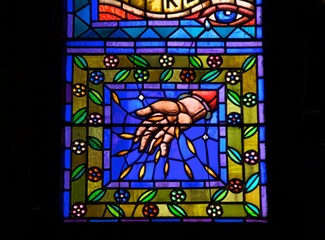 Stained glass with hand & flowers, St. Vitus Cathedral, Prague