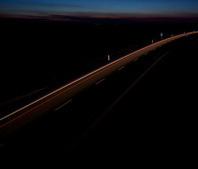 Cars moving fast on a highway