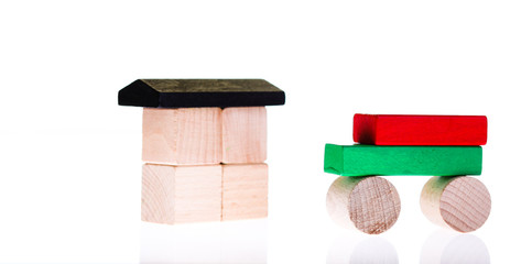 Wooden toy colorful blocks isolated on white