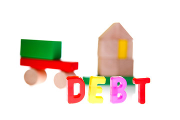 Concept of debt and credit from toy blocks
