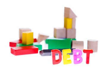 Concept of debt and credit from toy blocks
