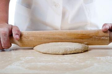 woman hands knead dough