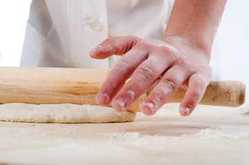 Obraz na płótnie Canvas woman hands knead dough