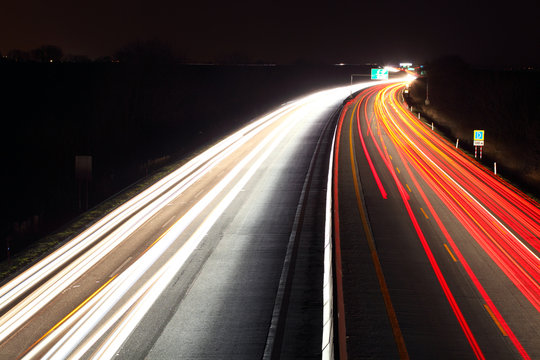 Long exposure photo of traffic on the move at night