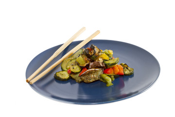 chopsticks and mixed grilled vegetables