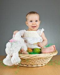 Young cute baby in an easter setting