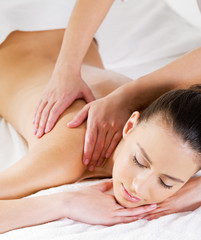 Massage on shoulder for woman