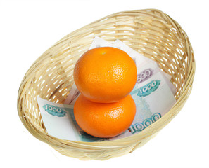 Orange in basket with russian rubles