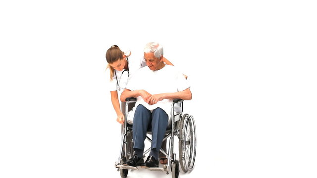 Nurse with her male patient in wheelchair