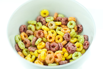 Bowl with corn flakes on the white background