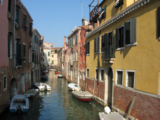 boats moored on a canal in Burano near Venice