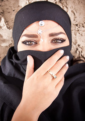 Young beautiful muslim lady in hijab with brown eyes