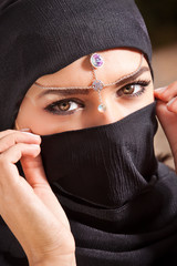 Young arabian woman in hijab with sexy brown eyes