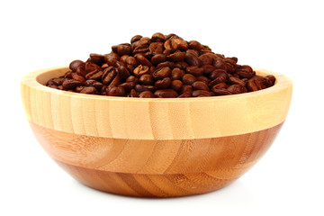 Plate with coffee beans isolated on white
