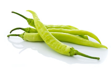 Green chilly on white background